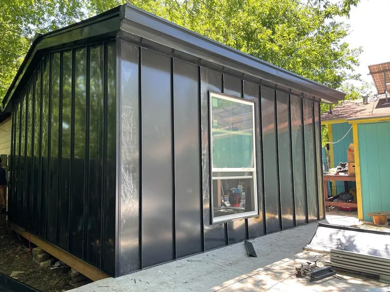 Black standing seam metal wall panels for Metal Roof Installation in Hyrum